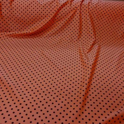 Lycra satin orange saumone pois noirs 3 