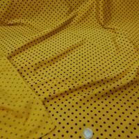 Lycra satine jaune imperial pois noirs moyens