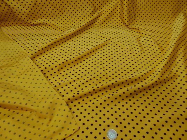 Lycra satine jaune imperial pois noirs moyens