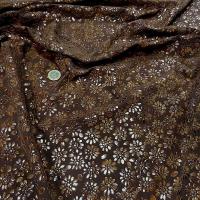 Lycra teinte moka fleurs appliquees