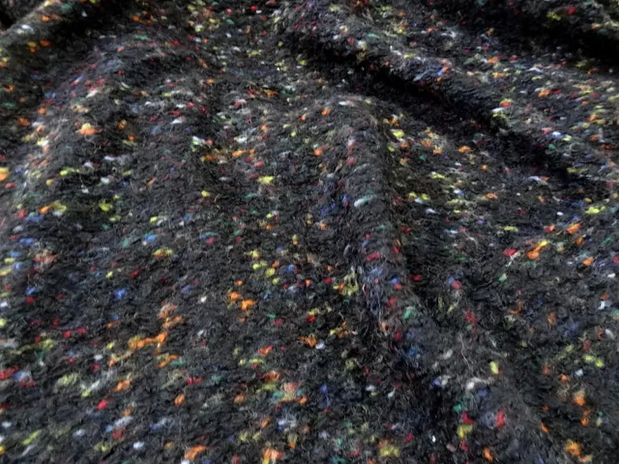 Maille de lainage bouclée noire chinée pour couture de vêtements chauds