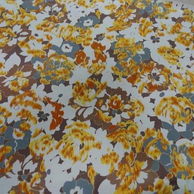 Microfibre blanche imprime fleurs ton safran