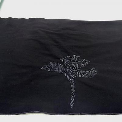 Motif fleur stylisee brodee noire sur lycra 2 