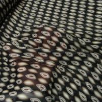 Mousseline crepon fond noir motif noyaux marron 1