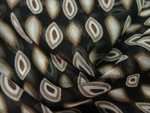 Mousseline crepon fond noir motif noyaux marron 2