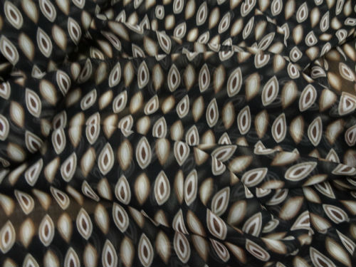 Mousseline crepon fond noir motif noyaux marron 3