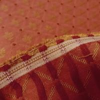 photo d'un Piqué de coton orangé montrant l'endroit et l'envers