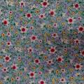Popeline coton bleu imprime liberty fleurs blanche jaune et rouge