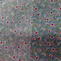 popeline coton bleu imprimé liberty fleurs blanche,jaune et rouge