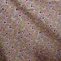 Popeline coton rose saumone a petites fleurs