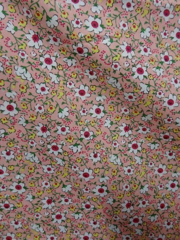 Popeline coton rose saumone a petites fleurs