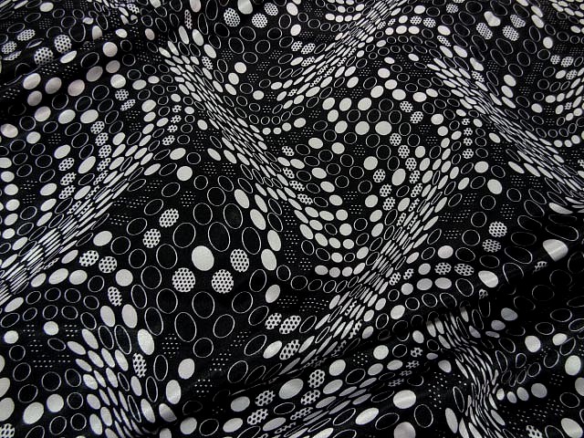 Satin noir imprime pois blanc effet d optique 1