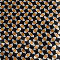 Satin polyester imprimé yeux ocres 02