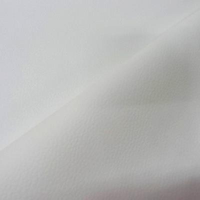 skaï fin blanc martelé en 1.40 m de large