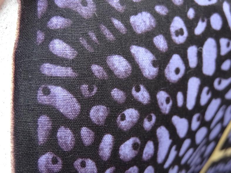Tissu coton wax frises geometriques amethyste blanc paille