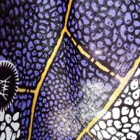 Tissu coton wax frises geometriques amethyste blanc paille
