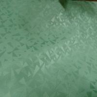 Tissu jacquard vert jade motif geometrique 1