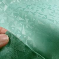 Tissu jacquard vert jade motif geometrique 2