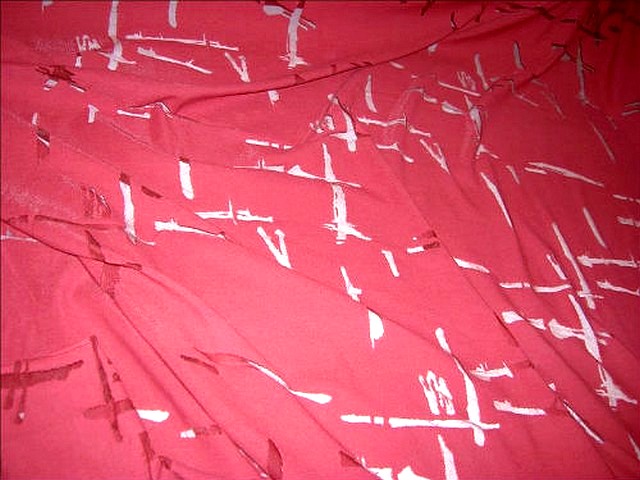 Tissu jersey devore rouge bordeaux