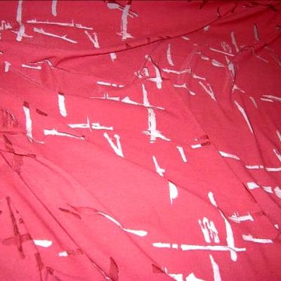 Tissu jersey devore rouge bordeaux
