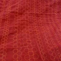 Tissu poly rouge groseille brode fil orange 1