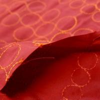 Tissu poly rouge groseille brode fil orange 4