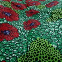 Tissu wax beaux pavots sur fond vert prairie