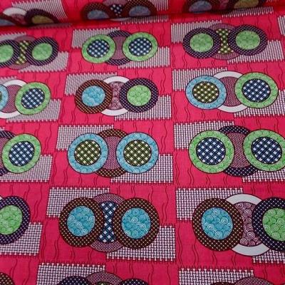 Tissu wax rose vif motif cercles