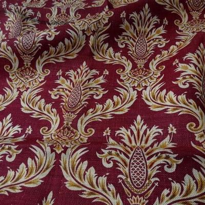 Toile de jute imprimée motif baroque fond rouge framboise