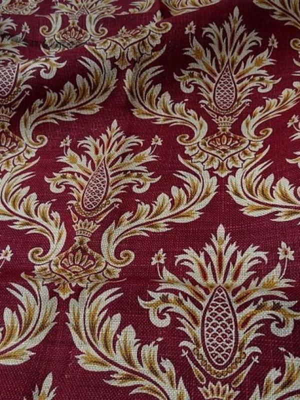 Toile de jute imprimée motif baroque fond rouge framboise