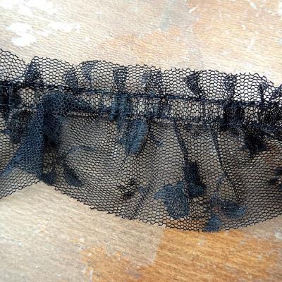 Tulle pre plisse noir motif tulipe 1 